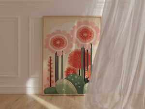 Whimsical wall art print featuring oversized coral flowers and green cacti in a modern boho style.