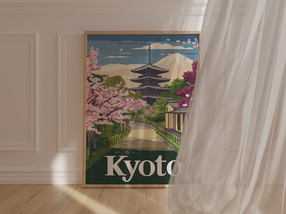 Vintage travel poster of Kyoto featuring cherry blossoms, a pagoda, and mountains.